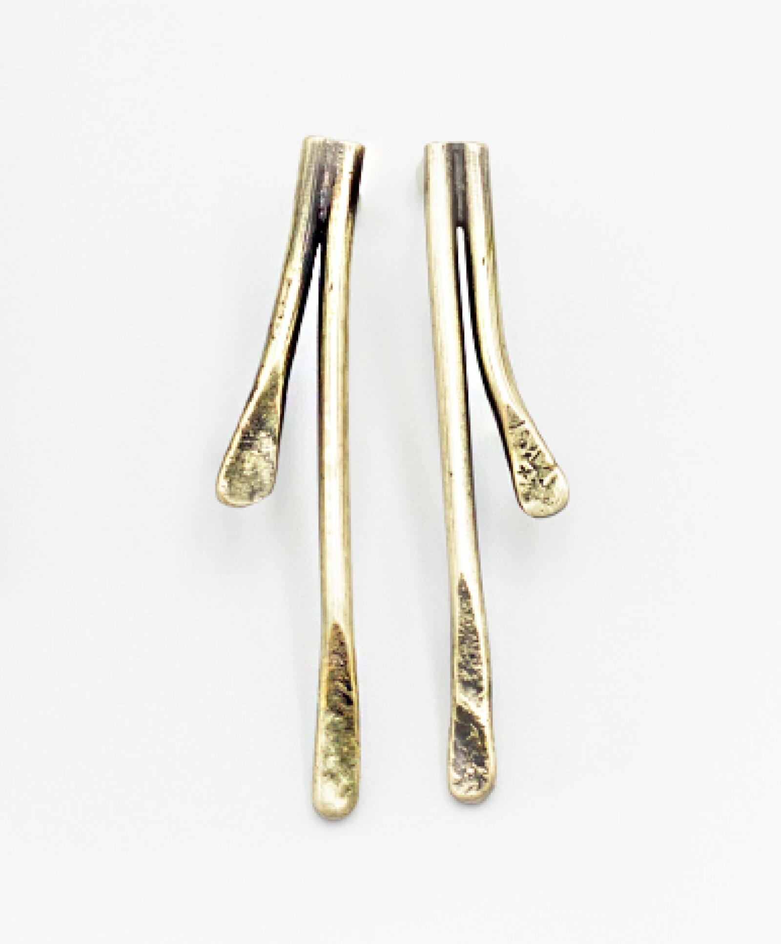 Long sculptural bronze earrings with blackened gold patina